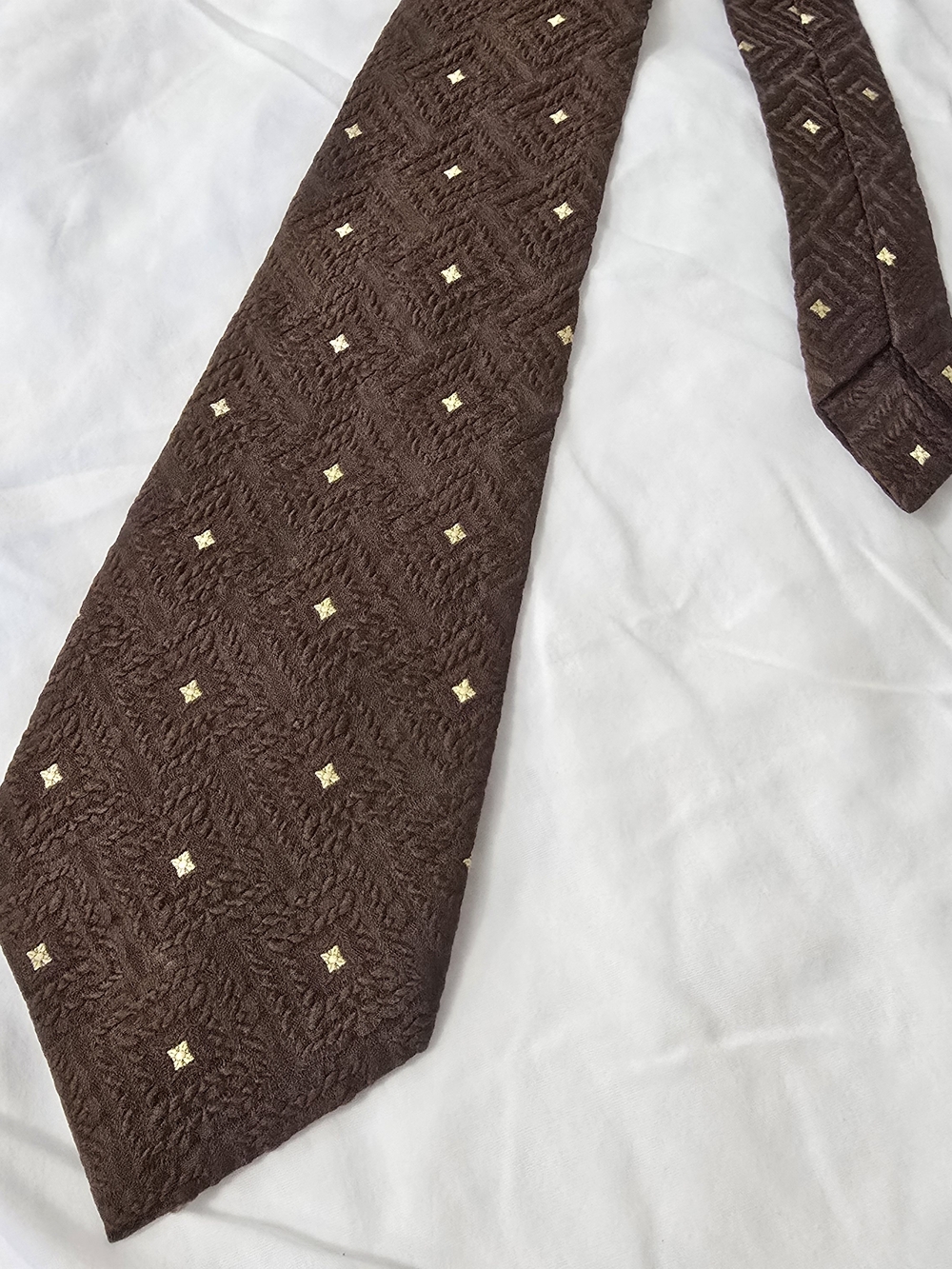Classic Brown Men's Tie with Subtle Gold Motif